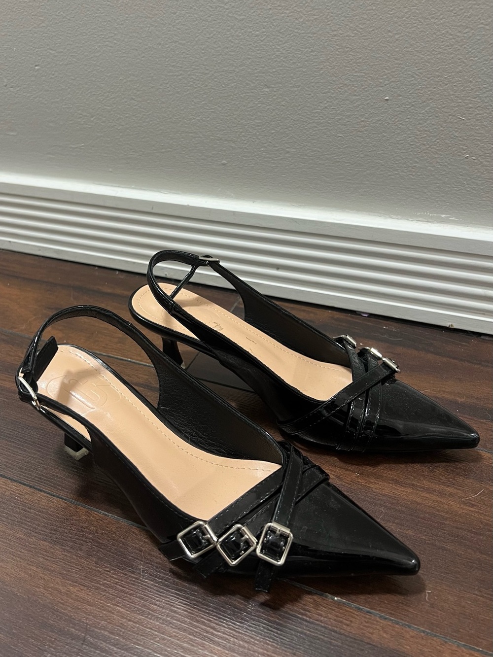 Black Patent Slingback Pointed-Toe Heels with Buckle Detail